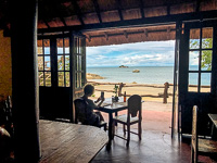 Susan eating breakfast at the Makuzi Beach Resort Susan's Story, Susan eating breakfast at the Makuzi Beach Resort