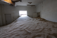 the sand is coming into the hospital here at Kolmanskuppe Ghost Town Photo from Susan's Story, the sand is coming into the hospital here at Kolmanskuppe Ghost Town