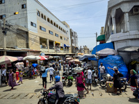 the interesting crowded outdoor market Susan's Story, the interesting crowded outdoor market