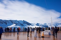 Passengers on the bow deck of Zaandam enjoying the beautiful weather and scenery of Wilhelmina Bay in Antarctica Photo from Susan's Story, Passengers on the bow deck of Zaandam enjoying the beautiful weather and scenery of Wilhelmina Bay in Antarctica