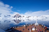 Passengers on the bow deck of Zaandam enjoying the beautiful weather and scenery of Wilhelmina Bay in Antarctica Susan's Story, Passengers on the bow deck of Zaandam enjoying the beautiful weather and scenery of Wilhelmina Bay in Antarctica