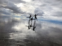 Susan and Hugh on the flooded Uyuni salt flats Susan's Story, Susan and Hugh on the flooded Uyuni salt flats