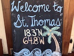 a sign welcomes us to St. Thomas Photo from Susan's Story, a sign welcomes us to St. Thomas