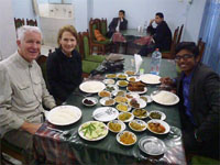 Photo of Salman, Susan, and Hugh eating in Bangladesh Photo of Salman, Susan, and Hugh eating in Bangladesh