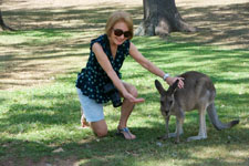 Photo of Susan with a kangaroo at Lone Pine in Brisbane