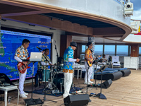 Addis band entertaining us as we soak up rays at the pool Photo from Susan's Story, Addis band entertaining us as we soak up rays at the pool