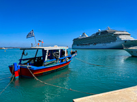 A fishing boat in port of Katakolon with Marina in the background Photo from Susan's Story,A fishing boat in port of Katakolon with Marina in the background