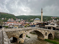 The famous view in Prizren showing the bridge, the mosque, the old church on the hill, and the fortress atop the hill Susan's Story, The famous view in Prizren showing the bridge, the mosque, the old church on the hill, and the fortress atop the hill