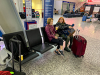 Susan and Mira in the airport in Tirana for our 4:50am flight to Vienna Photo from Susan's Story, Susan and Mira in the airport in Tirana for our 4:50am flight to Vienna