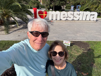Hugh and Susan standing in front of the Messina sign Susan's Story, Hugh and Susan standing in front of the Messina sign