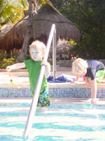 Hudson and Cooper in the swimming pool Susan's Story, a picture of Hudson and Cooper in the swimming pool