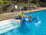 Hudson & Cooper in their pool Susan's Story, Hudson & Cooper in their pool