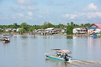Photo from Susan's Story, The houses along the river as we journeyed to Bako National Park in Sarawak, near Kuching in one of the Borneo states of Maylasia