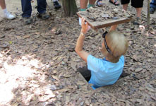 Susan climbing down in one of the tunnels. She was the only one small enough to get in Susan's Story, Susan climbing down into one of the tunnels. She was the only one small enough to get in