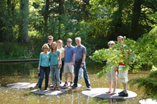 this would be our family picture for our Christmas card this year Photo from Susan's Story, this would be a picture for our Christmas card this year. We are all standing on Lily pads